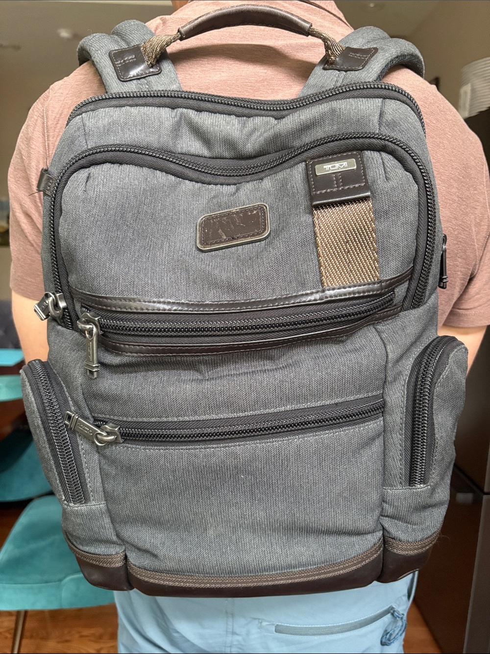 Tumi Gray Men's Compact Travel Backpack with Multiple Zippered Pockets
